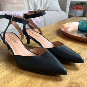 Black pumps with ankle straps